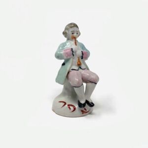 Occupied Japan Flute Player Figurine