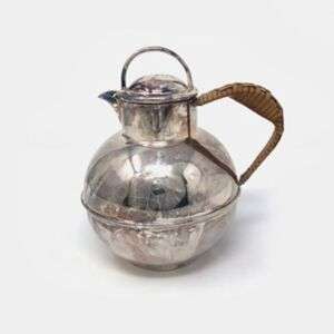 Modernist Silver Plated Guernsey Jug With Rattan Woven Handle