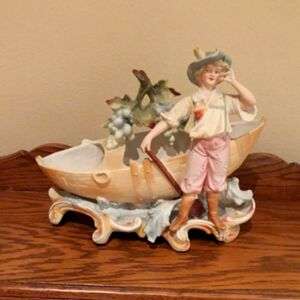 Antique Bisque Figurine - Boy With Boat Planter And Grapes